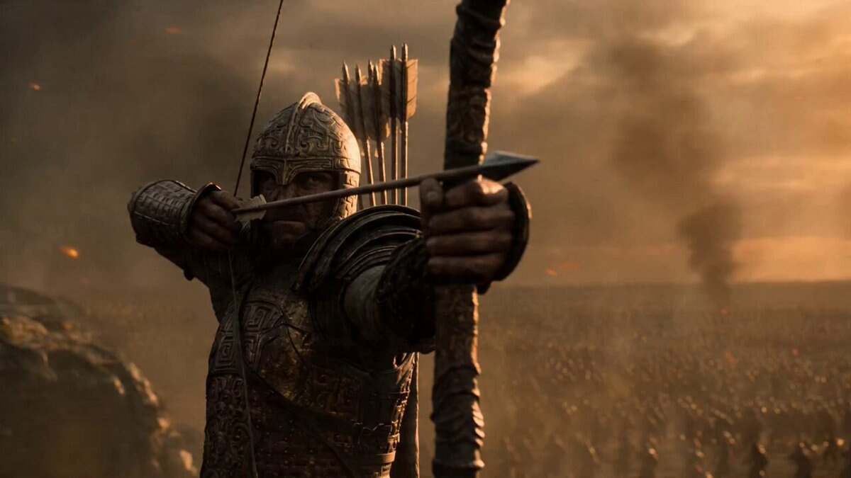 Epic wide-angle shot of a vast ancient battlefield at gol...